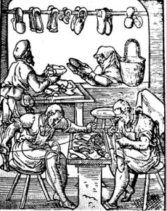 woodcut_of_medieval_shoemaking